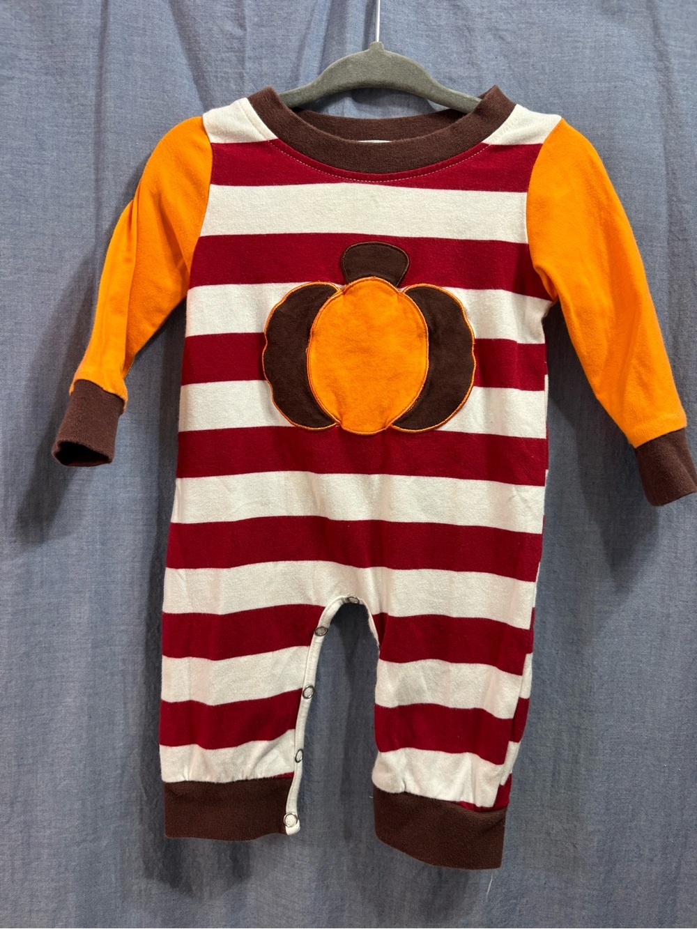 Striped Pumpkin Appliqué Baby One-Piece in Red & Orange
